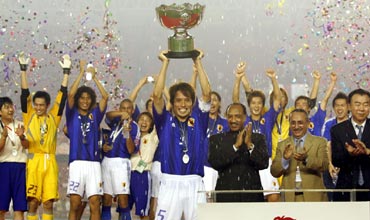 Japan captain Tsuneyasu Miyamoto lifts the Asian Cup